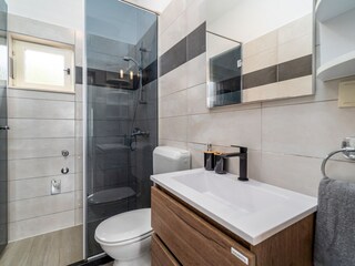 There is also a family bathroom with a shower.
