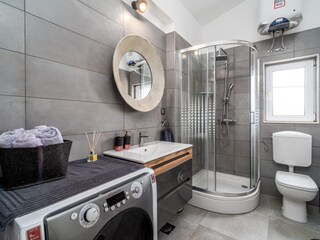 There is also a family bathroom with a shower