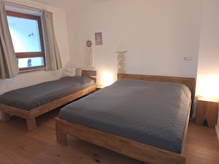Doppelbett und Einzelbett