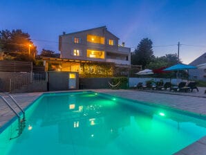 Ferienwohnung GISELLE mit großer Terrasse und beheiztem Pool 50m2 - Nerezine - image1