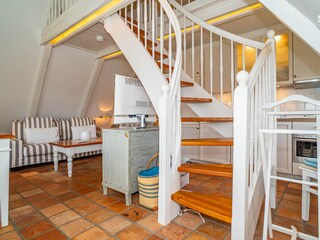 Wendeltreppe in den oberen Bereich