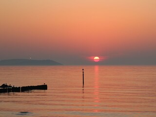 Sonnenuntergang in Dranske mit Blick auf Hiddensee