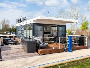 Huisboot unieke Houseboat op en aan het Sneekermeer - Uitwellingerga - image1