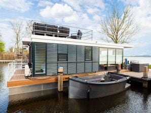 Einzigartiges Hausboot auf und um das Sneekermeer - Uitwellingerga - image1