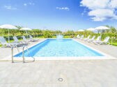 Vacation home with pool directly by the sea