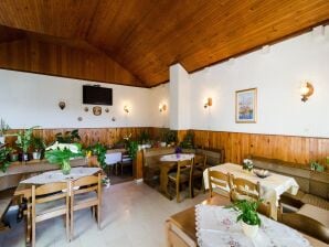 Apartment Guesthouse Moretic - Doppelzimmer mit Gartenblick 1