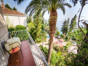 Apartment Guest House Villa Nina- Superior Triple Room with Balcony and Sea View (S2 - plava) - Mlini - image1