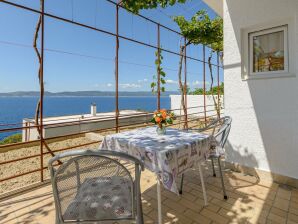 Apartment Rooms Sani- Double Room with Terrace and Sea View (S2) - Brela - image1