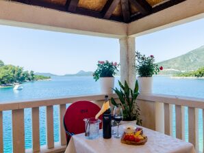 Apartments Melany - Studio Apartment with Shared Terrace and Sea View - Doli - image1