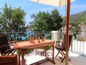 Apartments Seafront Silence - Studio Apartment with Terrace and Sea View - Trstenik - image1