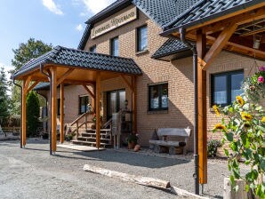 Ferienwohnung En la casa de campo Rügeband