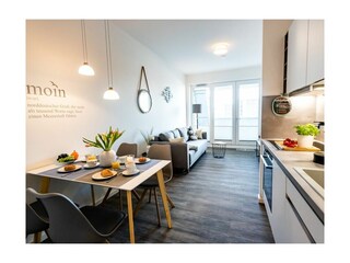 Hafenspitze App. 09 - Blick auf den Wohn-/ Essbereich