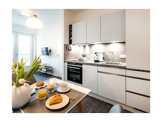 Hafenspitze App. 09 - Blick vom Essbereich auf die Küchenzeile