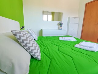 Air conditioned bedroom with double bed