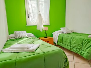 Bedroom with two single beds