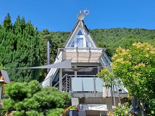 Rückseite Haus, mit Glasdach und seitlicher Verglasung