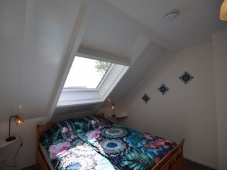 Schlafzimmer mit Doppelbett