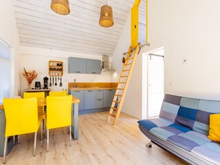 Livingroom, diner table and kitchen