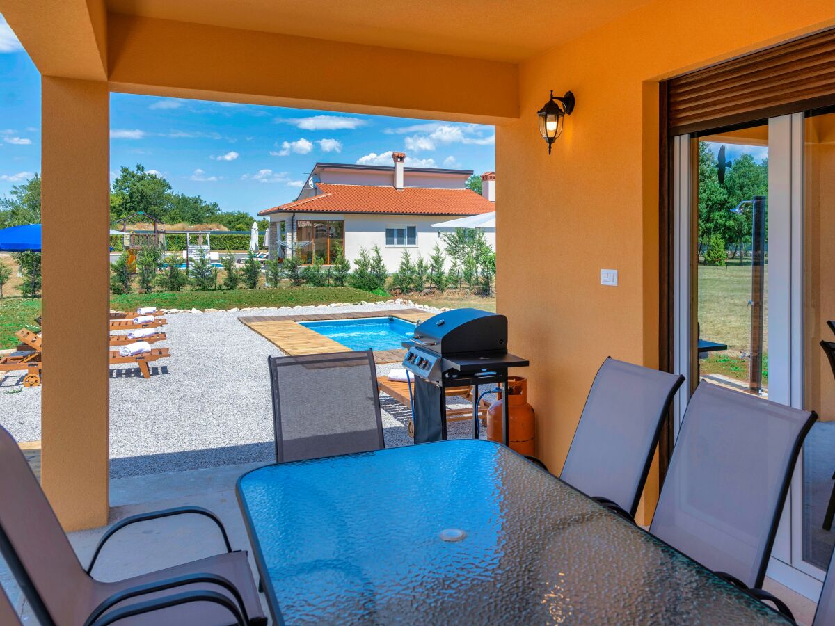 The veranda with a dining table