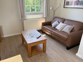 Wohnzimmer mit Funktionssofa