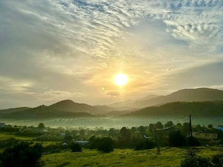 Blick bei Sonnenaufgang von der Terasse