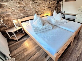 Schlafzimmer Konrad (EG): 2x Einzelbetten