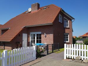 Holiday house Gemütliche Doppelhaushälfte in Neßmersiel: Meer, Garten und Erholung - Nessmersiel - image1