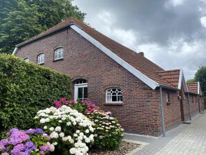 Apartment Ferienwohnungen in Strackholt - Firrel - image1