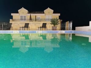 Apartments Villa Moonlight - One Bedroom Apartment with Sea View Balcony and Terrace (Sandra) - Okrug Gornji - image1