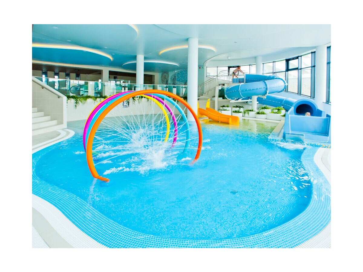 Water playground for children with a water channel