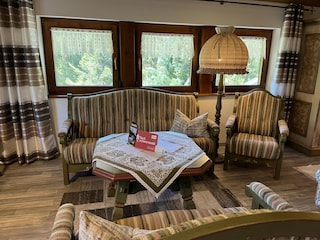 Familienzimmer mit Kachelofen