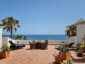 Terrasse mit Meerblick direkt am Strand