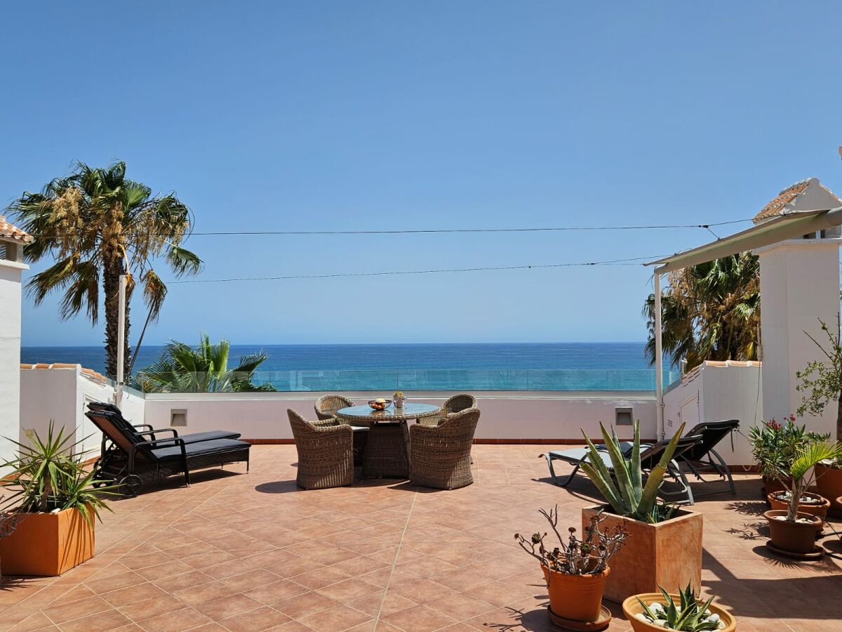 Terrace with sea view directly at the beach