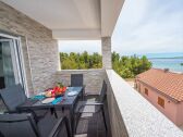 Roofed and furnished balcony