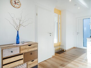 Eingangsbereich mit Garderobe und Kommode
