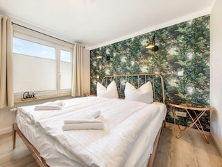 Das kleinere Schlafzimmer ...