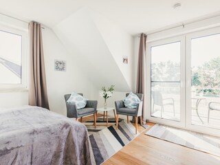 Schlafzimmer mit Balkon