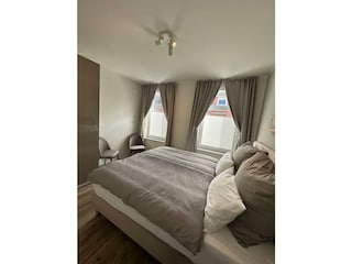 Schlafzimmer mit Verdunklungsgardinen