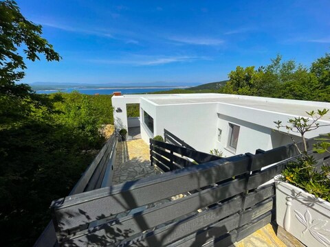 Vakantiehuis met bubbelbad, sauna en zeezicht