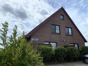 Appartement Ruime vakantiewoningen met eigen terras aan de Noordzeedijk, Nessmersiel - Neßmersiel - image1