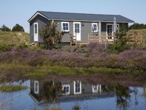 Parco vacanze Comodo chalet con lavastoviglie vicino alle dune di Texel - Il Corno - image1