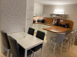 Open kitchen with dining area