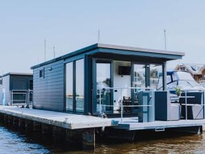 Vakantiepark Moderne woonboot met airco gelegen in jachthaven - Uitgeest - image1