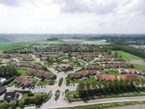 Parc de vacances Bungalow rénové avec deux salles de bains, plage à 500 m - Ellemeet - image1