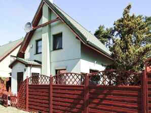 Ferienpark Gemütliches  Ferienhaus mit Kamin in Lukecin - Łukęcin - image1