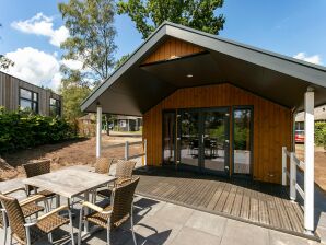 Holiday park Luxurious lodge with airco, located beside a lake - Hoge Hexel - image1