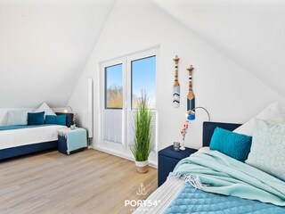 Schlafzimmer mit zwei Einzelbetten
