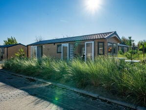 Vakantiepark Goed onderhouden chalet met terras - Hellevoetsluis - image1