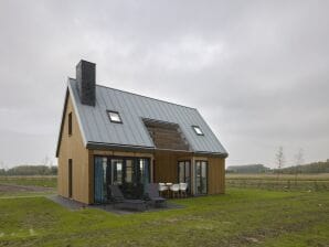 Parque de vacaciones Casona moderna con 3 cuartos de baño cerca del lago Veere - veere - image1