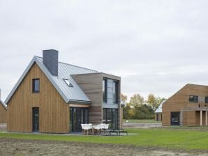 Parque de vacaciones Casona moderna con 3 cuartos de baño cerca del lago Veere - veere - image1